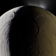 Illustration for article titled A geyser sprays water vapor from the surface of Saturns moon Enceladus